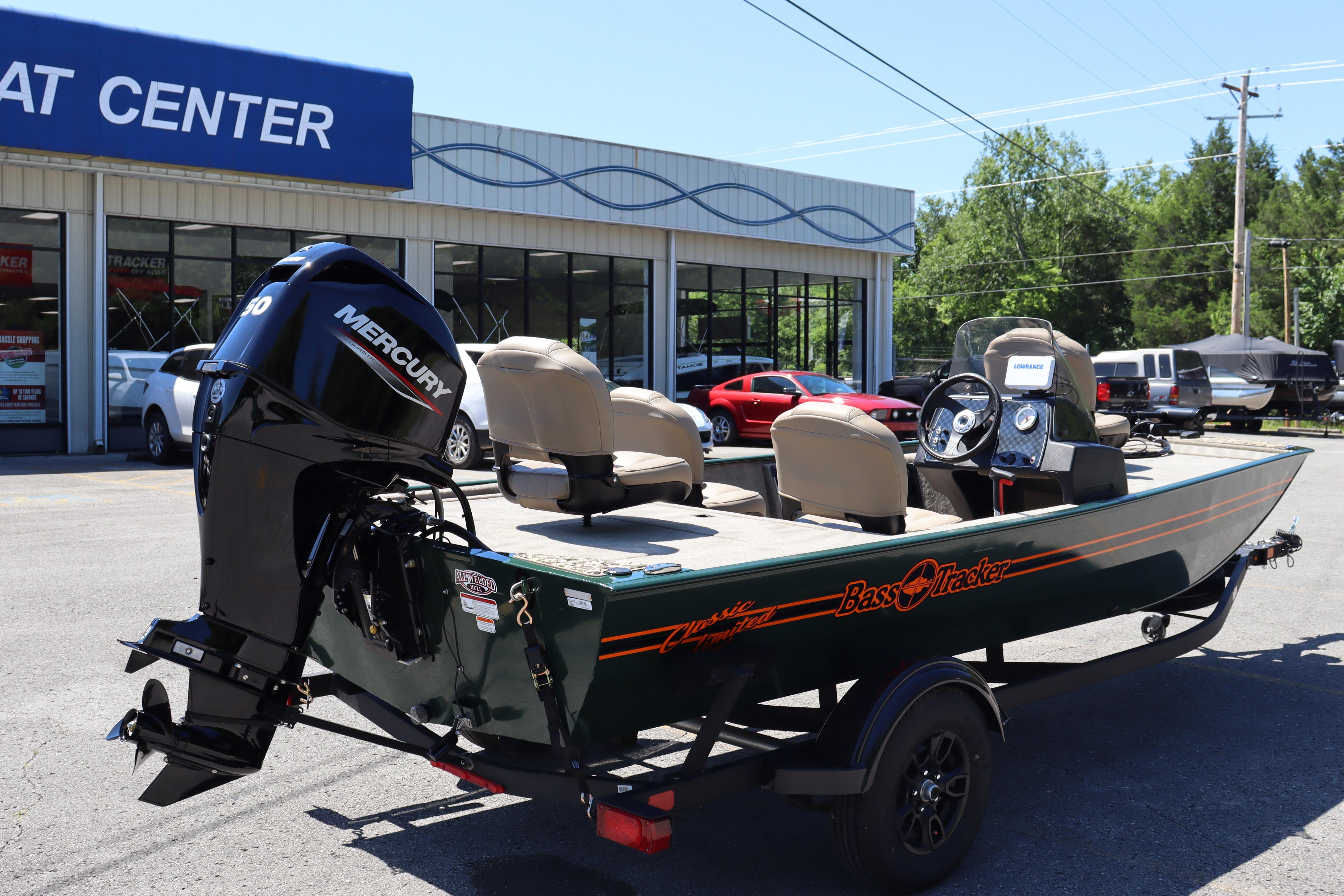 2026 Tracker Bass Tracker Classic Limited boat with Mercury engine at dealership.
