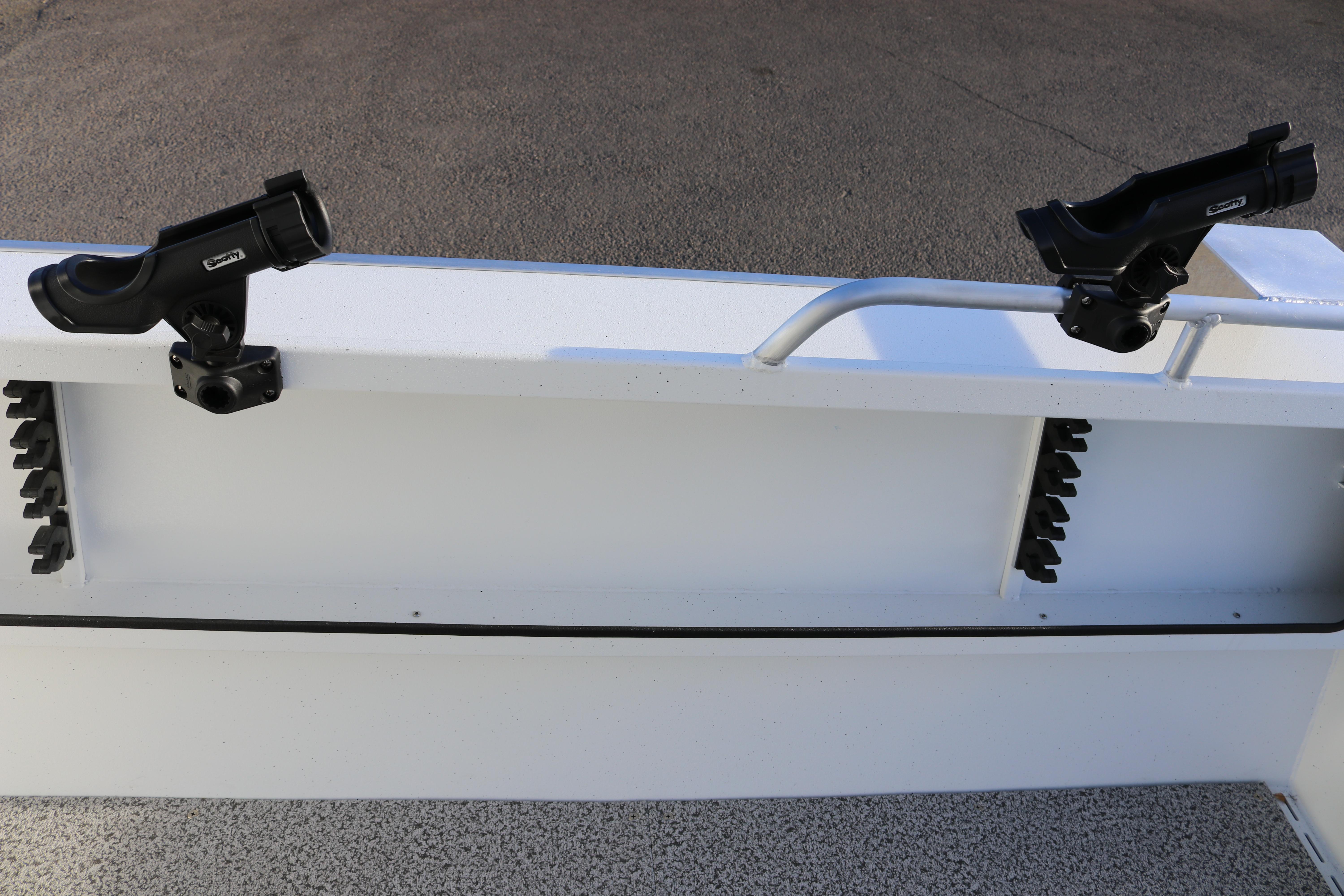 2026 Alumaweld Intruder Outboard 22 boat with mounted rod holders on deck.