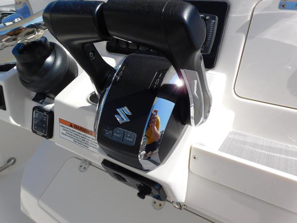 Close-up of the control panel on a 2024 Sailfish 242 CC boat.