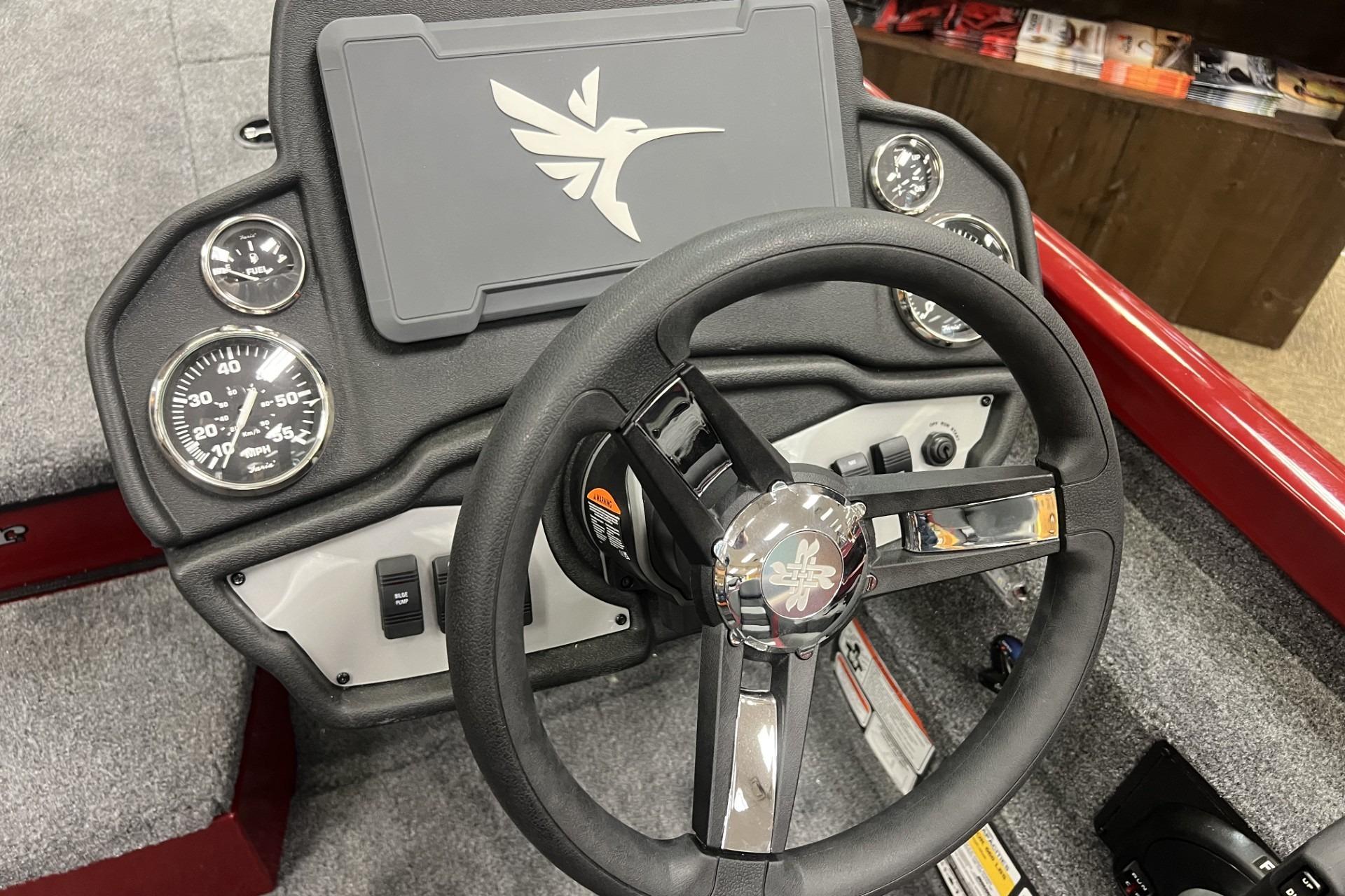 2026 Ranger RT198P boat dashboard with steering wheel and gauges.