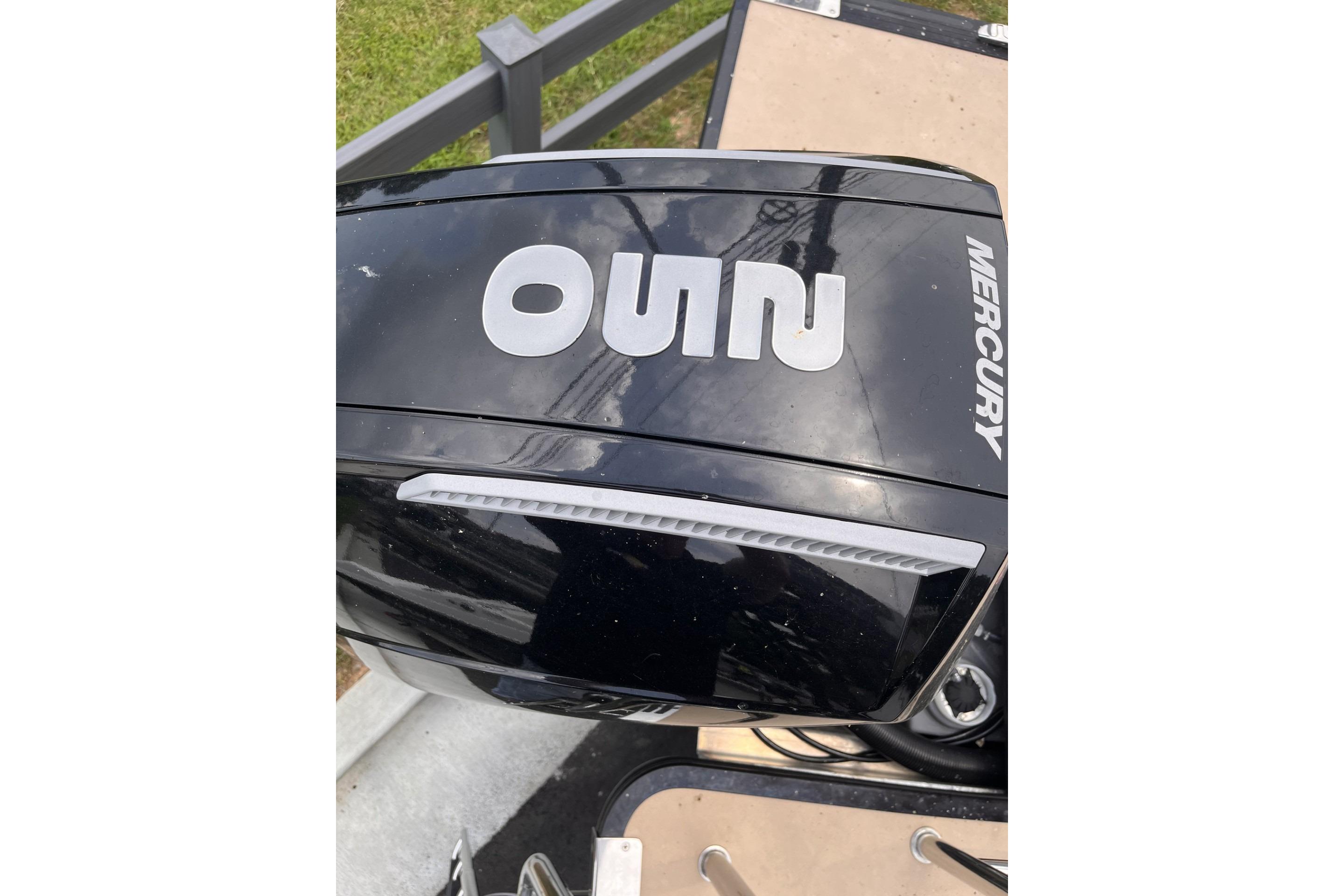 Outboard motor on a 2022 Harris Solstice 230 CWDH boat, featuring Mercury branding.