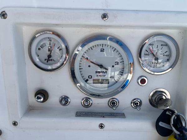 Dashboard of a 1980 Catalina 30 sailboat with fuel, RPM, and temperature gauges.