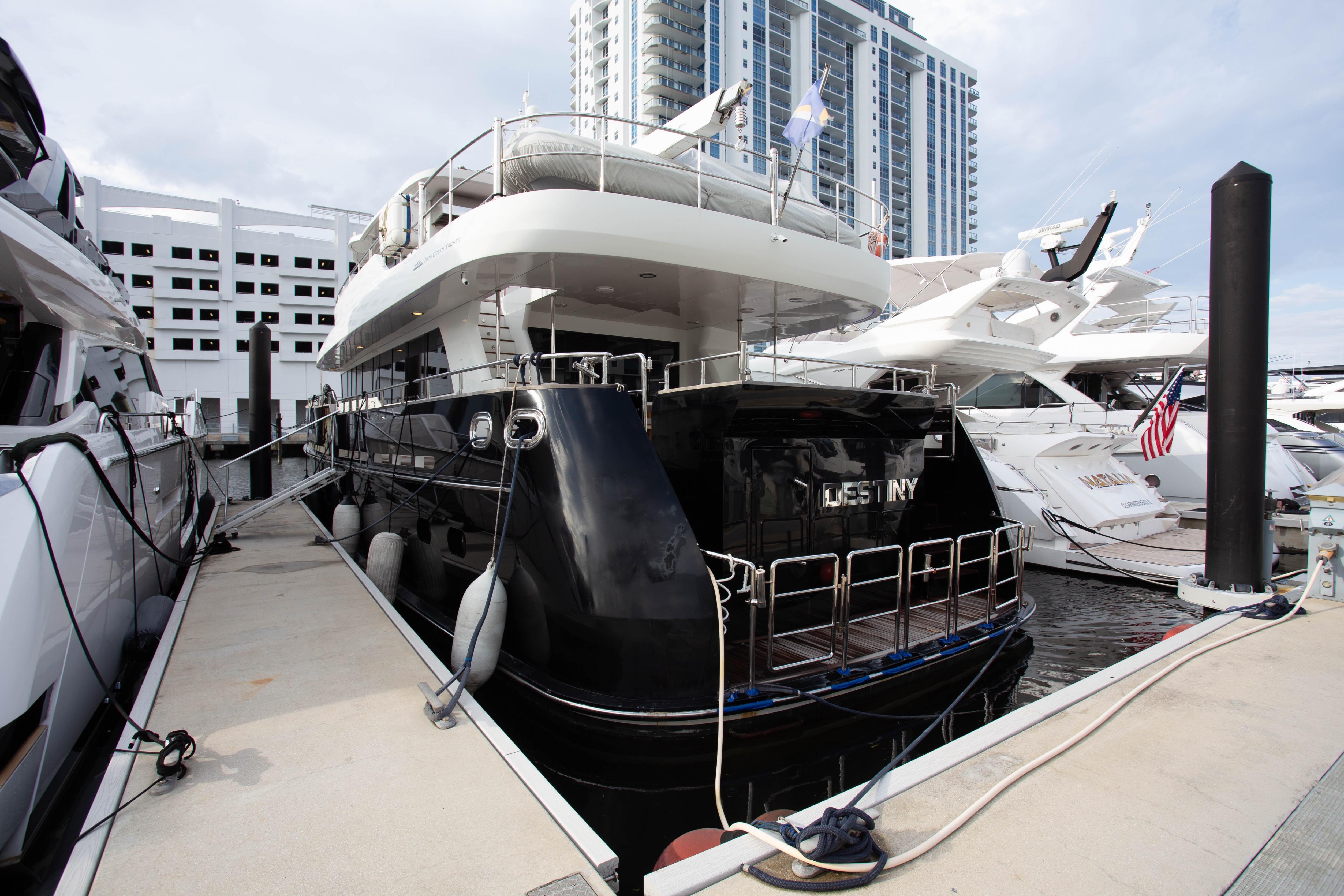 Luxury 2014 Fifth Ocean Yachts 24m Displacement Explorer Yacht docked at marina.