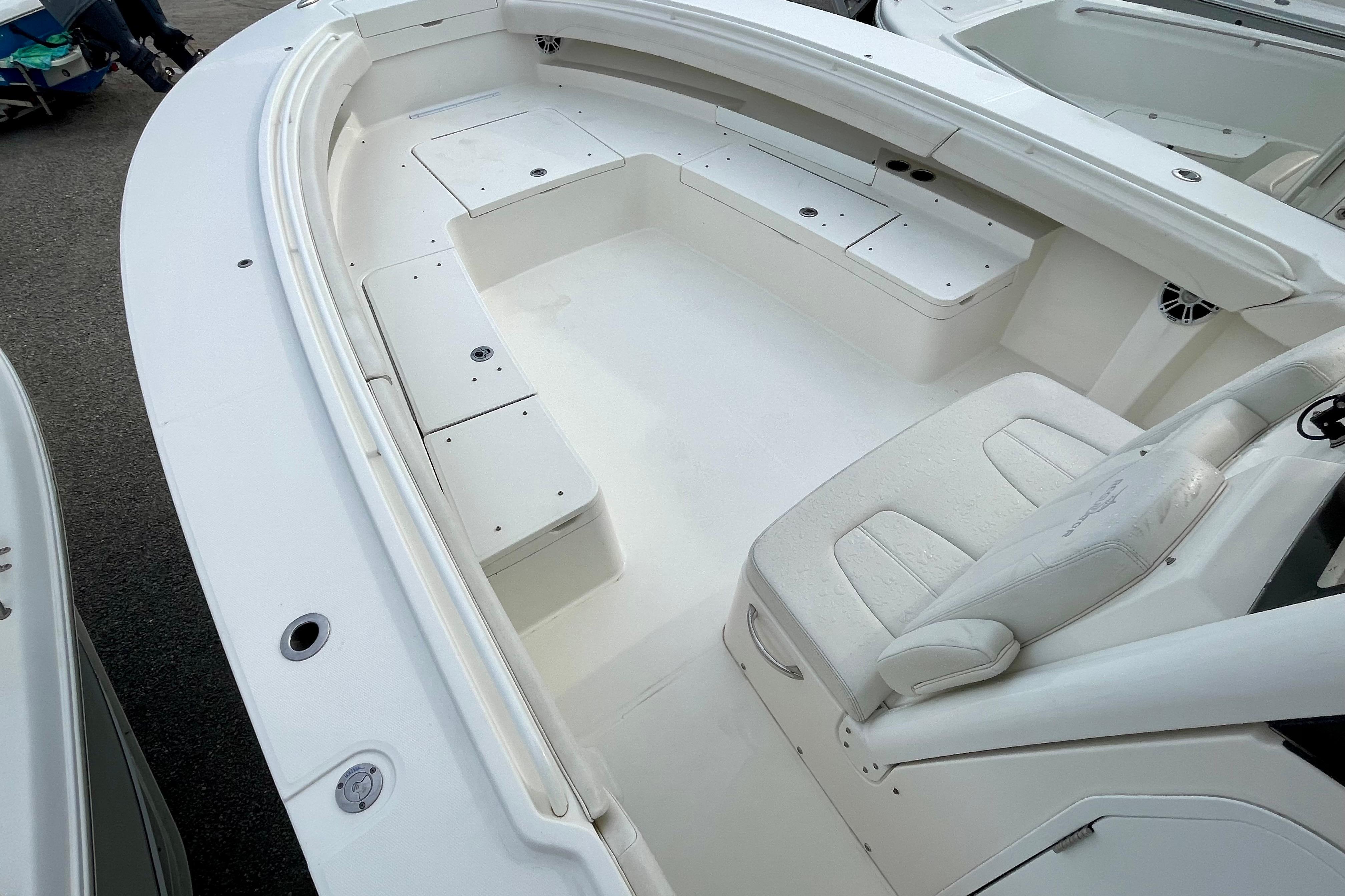 2023 Regulator 34 boat interior with white seating and storage compartments.