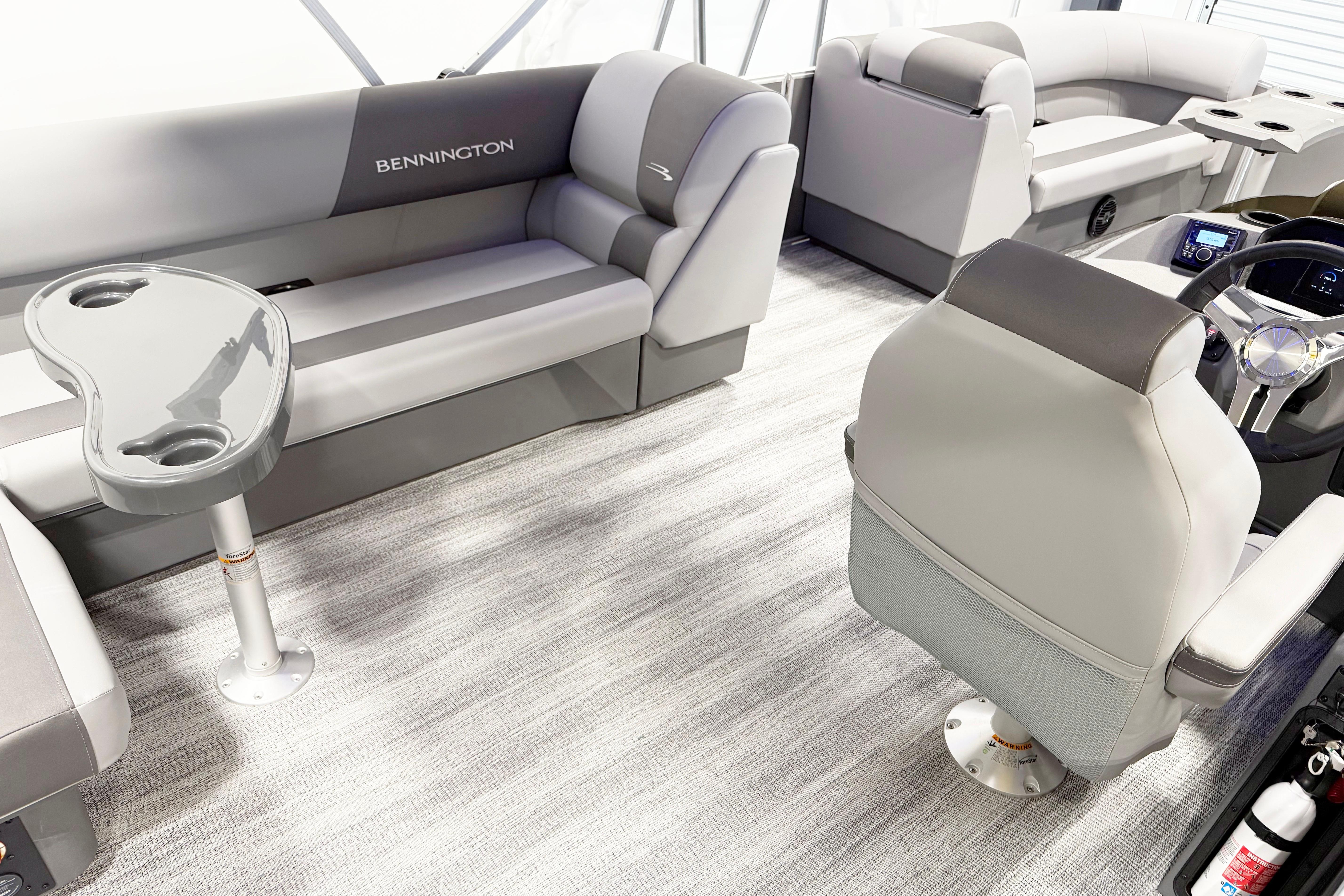 2025 Bennington 21S Cruise interior with plush seating and modern helm.