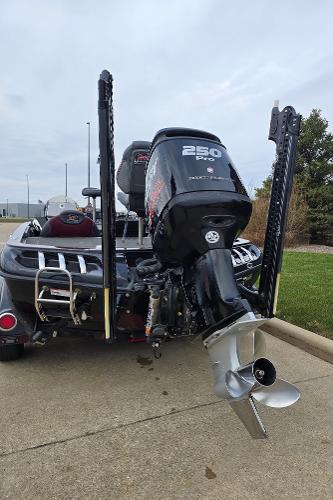 2017 Ranger Z520C boat with powerful 250 HP engine, parked on concrete.