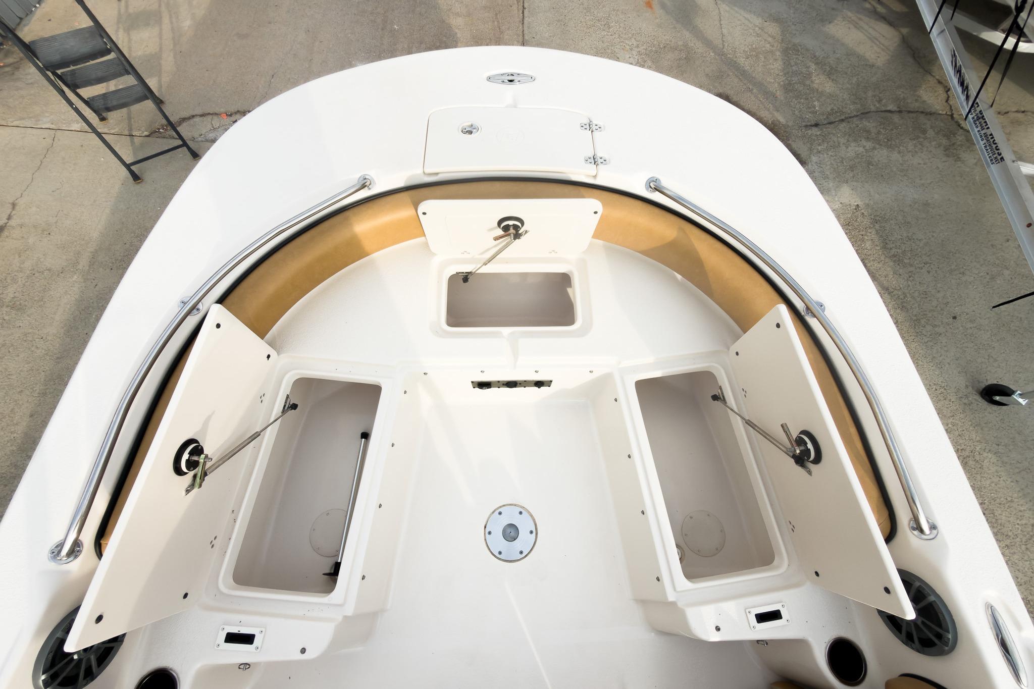 2025 Carolina Skiff 21 Ultra Elite boat interior with open storage compartments.