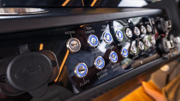Dashboard of a 2026 Hanover 415 with switches and buttons.