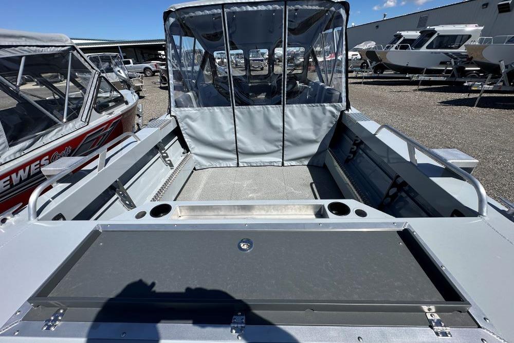 2026 Hewescraft 200 ProV ET boat interior with seating and storage compartments.
