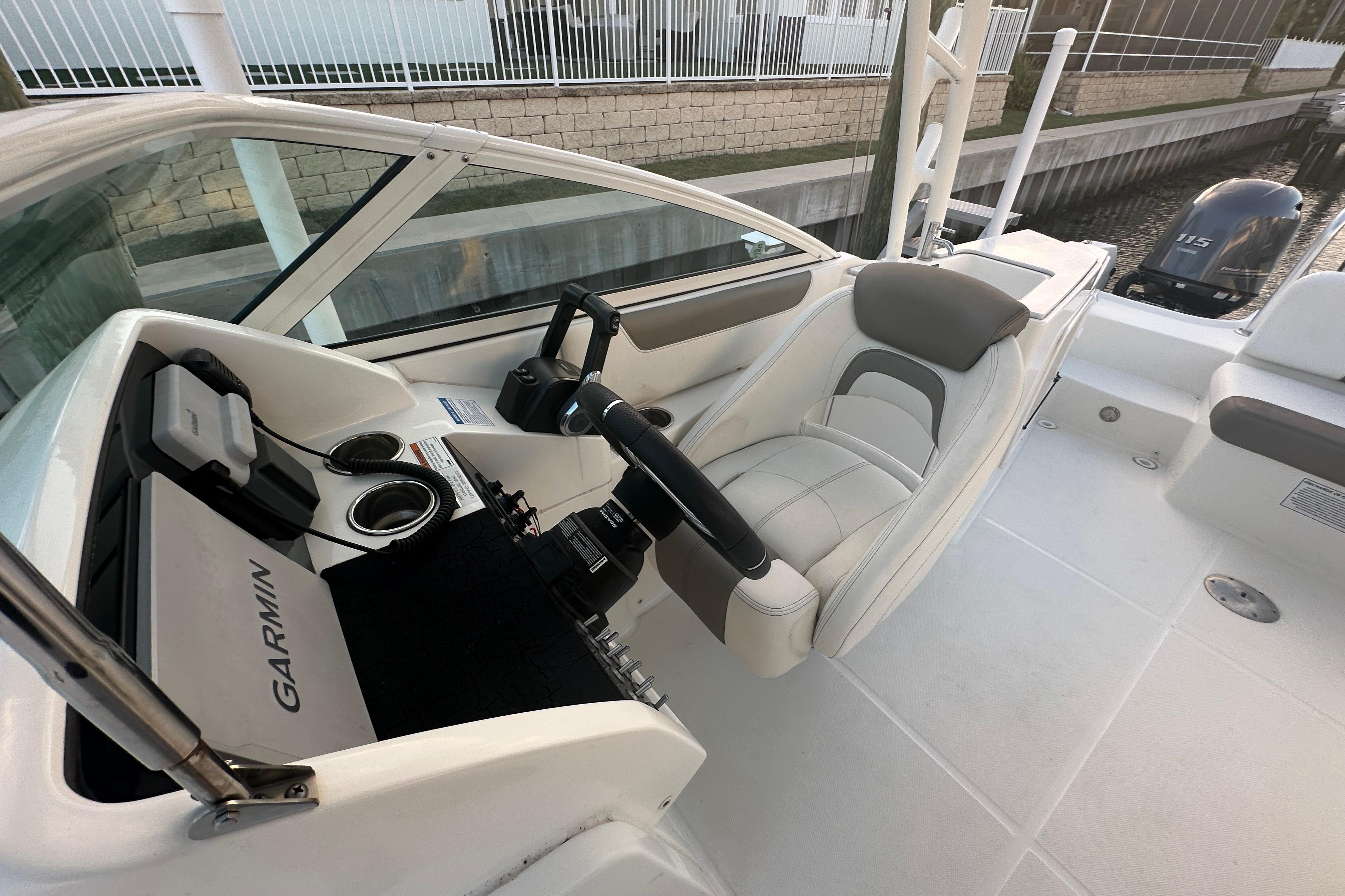 2021 World Cat 230 SD boat interior with Garmin navigation system and comfortable seating.