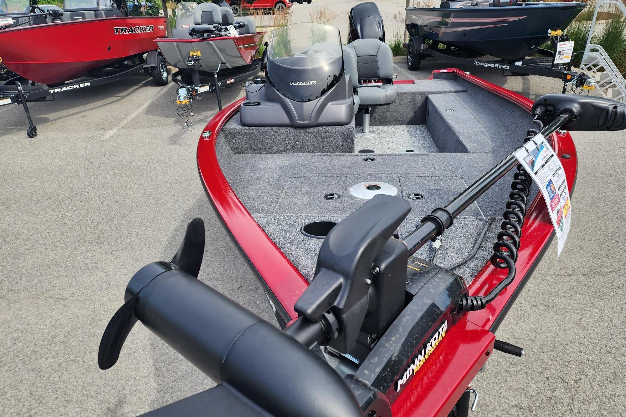 2026 Tracker Super Guide V-16 SC boat with red exterior and advanced trolling motor.