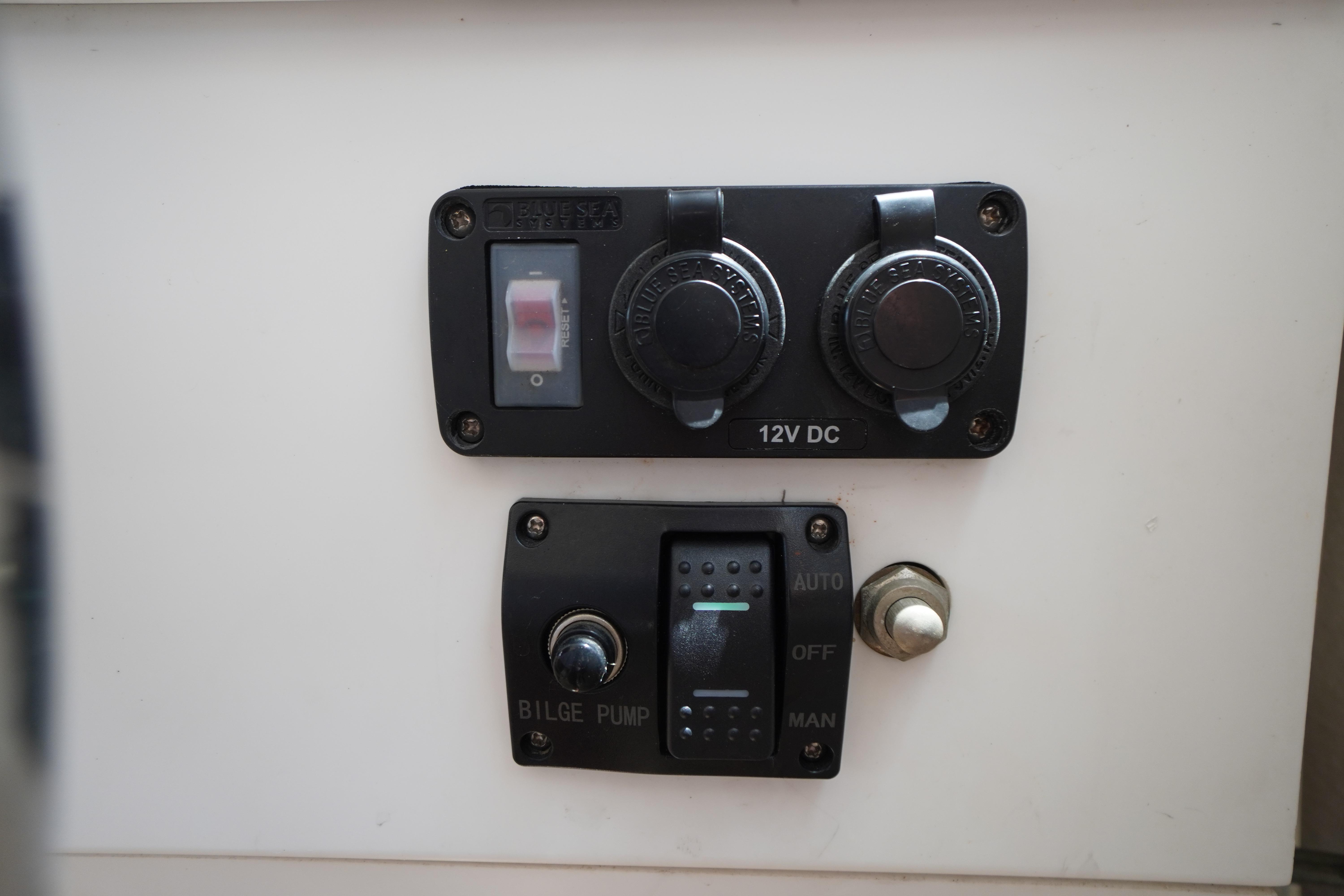Control panel of a 1989 Markley 35 Ft. Deadrise boat with bilge pump switch.