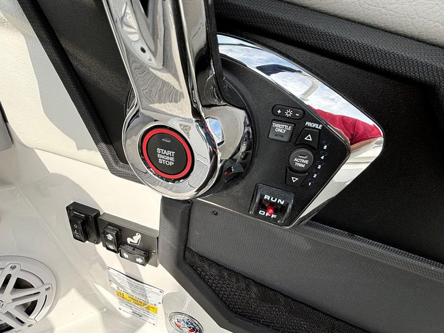 Control panel of 2025 Cobalt R6 Outboard boat with start-stop button and switches.
