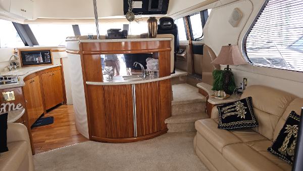 Luxurious interior of 2000 Carver 450 Voyager Pilothouse yacht with elegant furnishings.