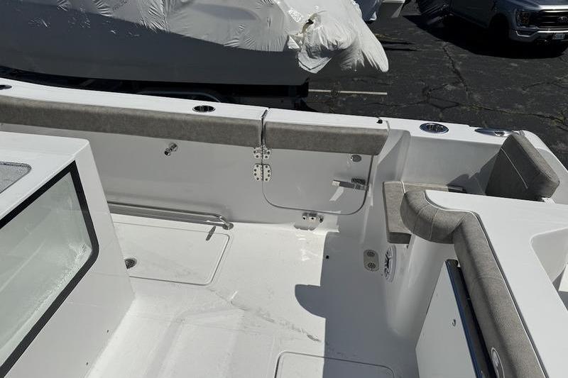 2026 Sea Hunt Gamefish 30 Forward Seating boat interior with cushioned seating and storage.