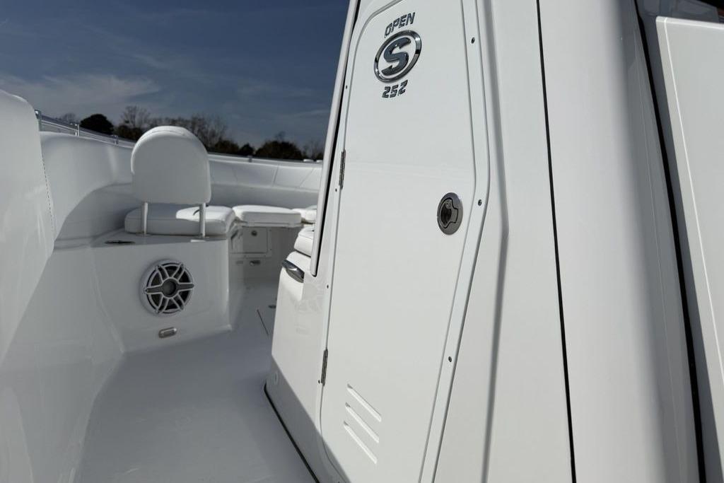 2026 Sportsman Open 252 Center Console interior with seating and speaker detail.