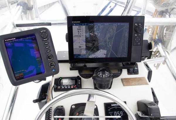 1979 Chaparral 224 Fisherman boat dashboard with navigation and communication equipment.