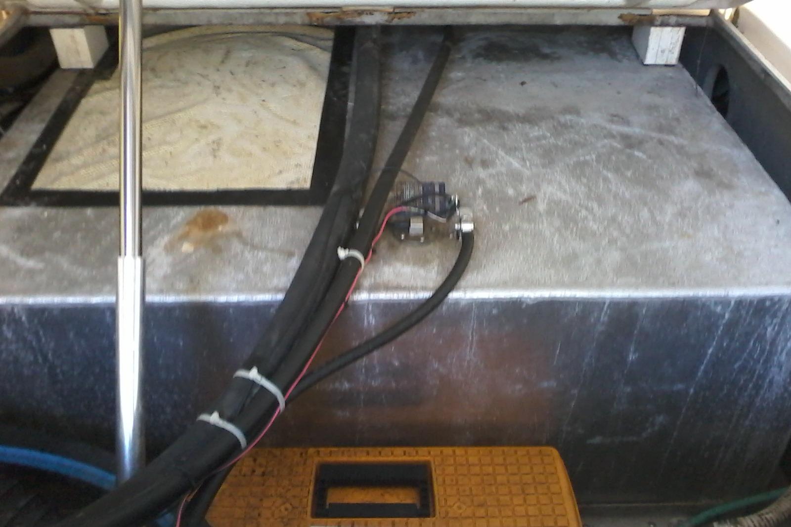 2002 Albemarle 265 Express Fisherman boat interior with wiring and metal components.