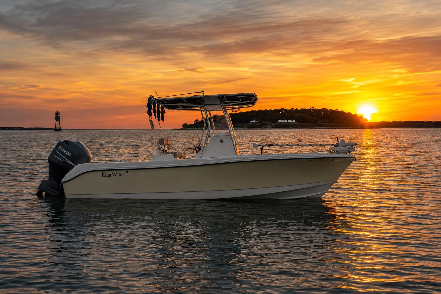 Edgewater 245CC boat on water at sunset, 2004 model.
