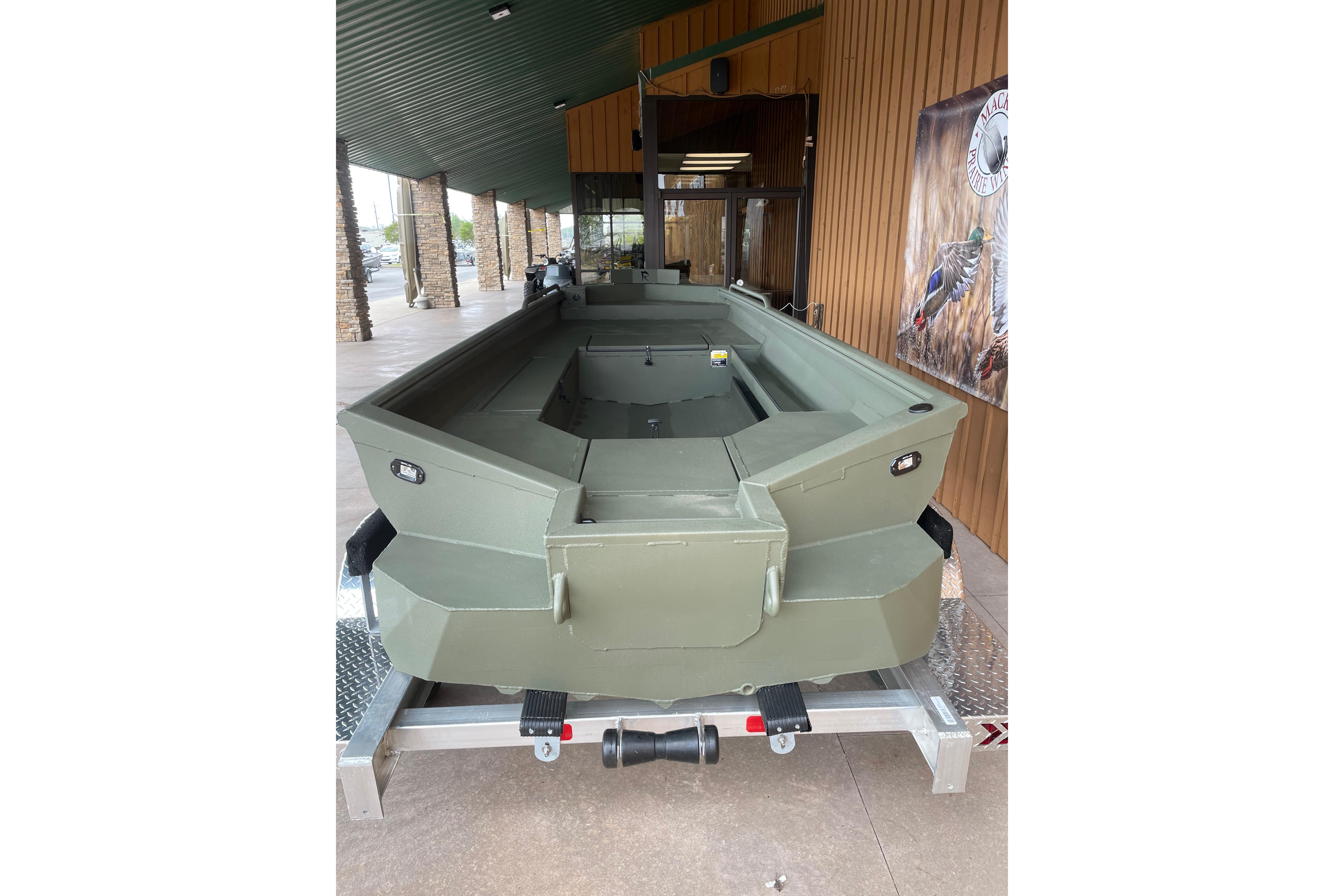 2026 Reaper Boats 753 Timber Reaper in showroom, olive green finish.
