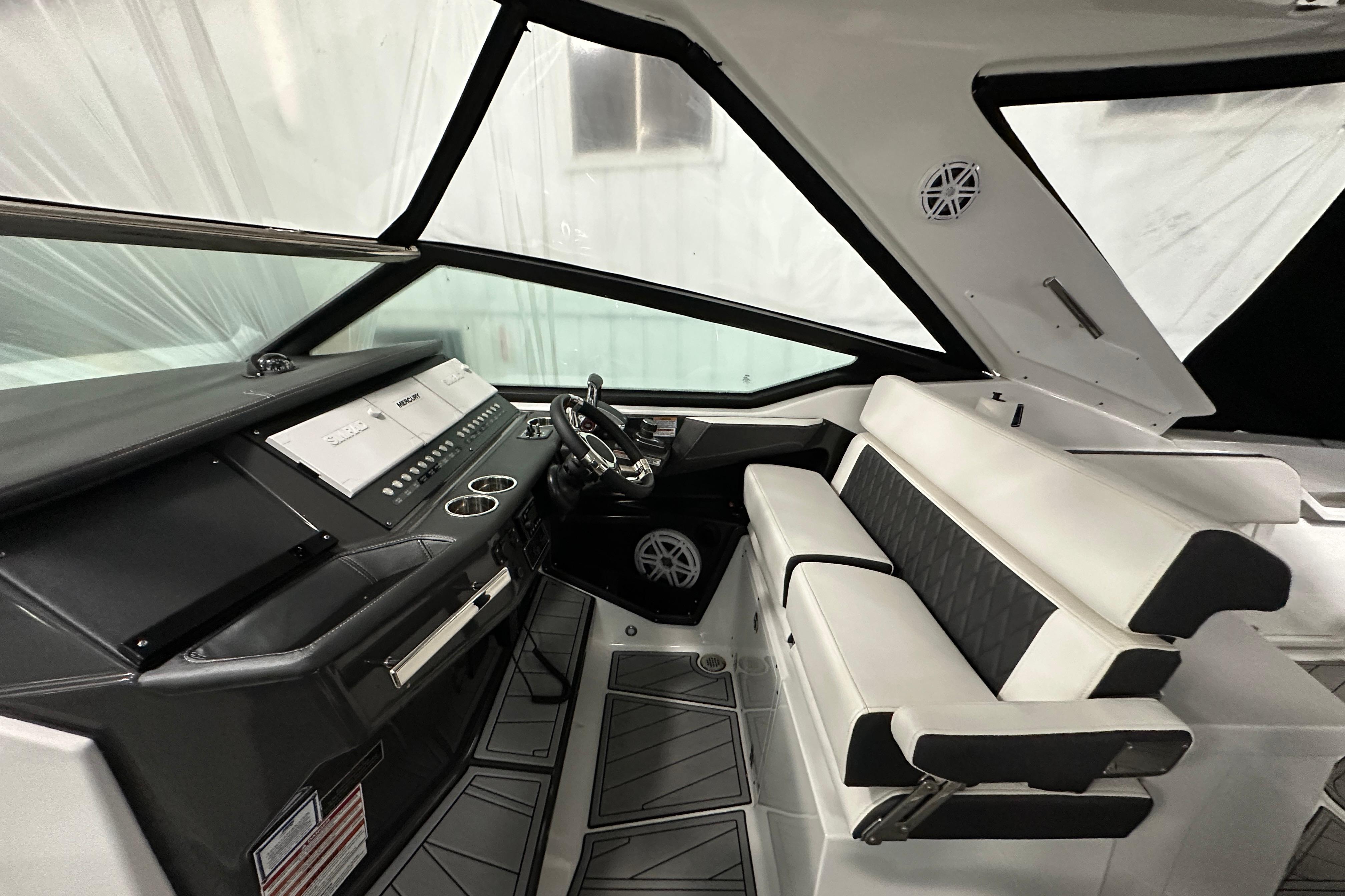 Interior of 2023 Monterey 378SS Super Sport boat with sleek dashboard and seating.