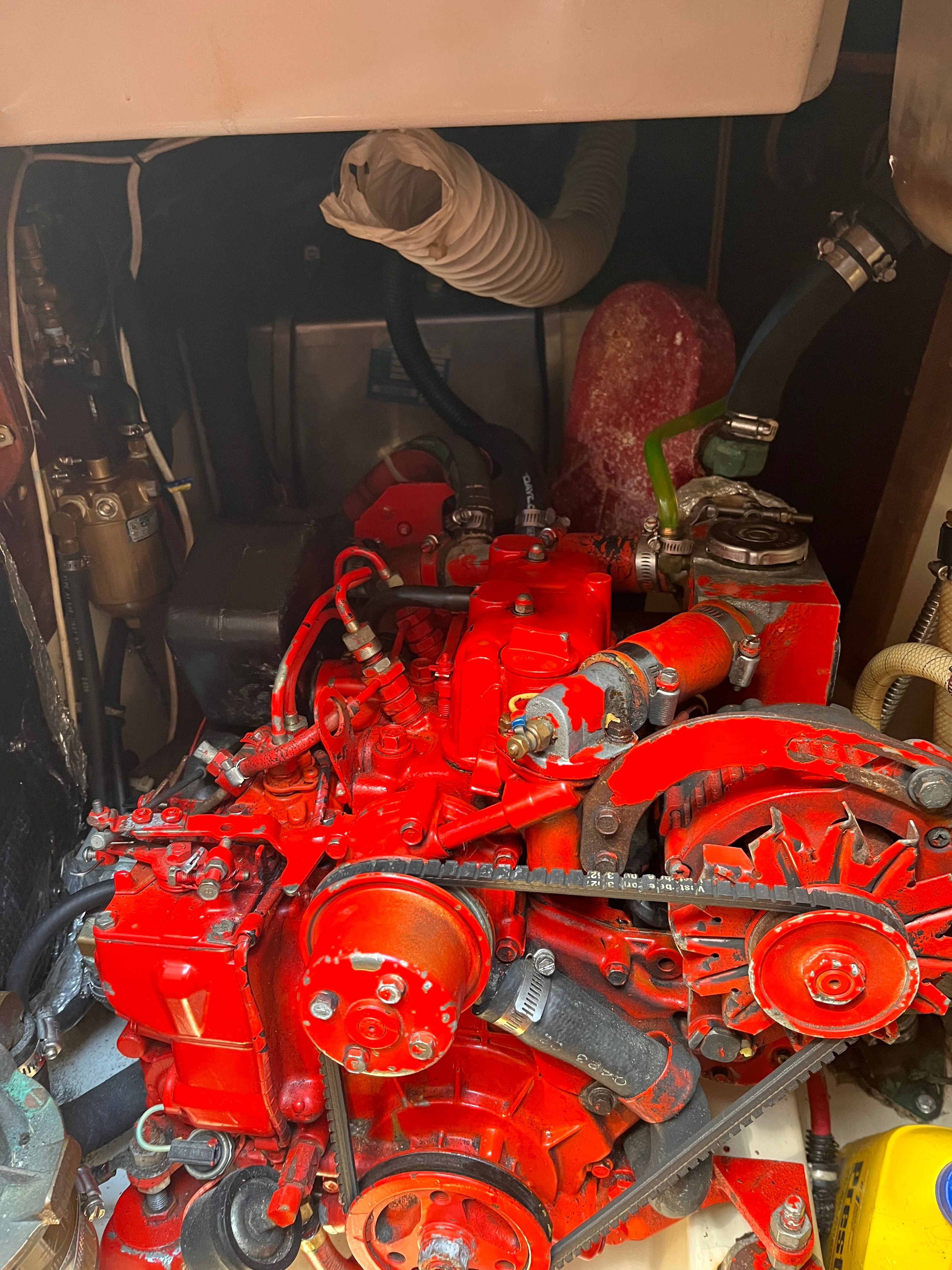 Red engine of a 1989 Sabre 30 III in the engine compartment.