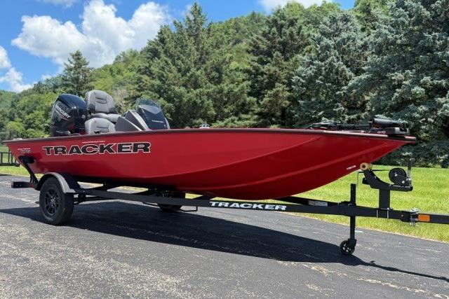 2026 Tracker Pro Team 175 Crappie Edition boat in vibrant red on a trailer.