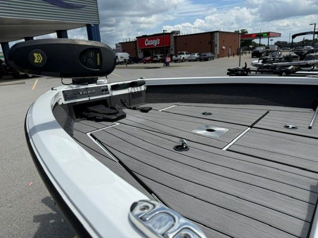 Vexus ADX180 boat 2024 on parking lot, close-up of deck.