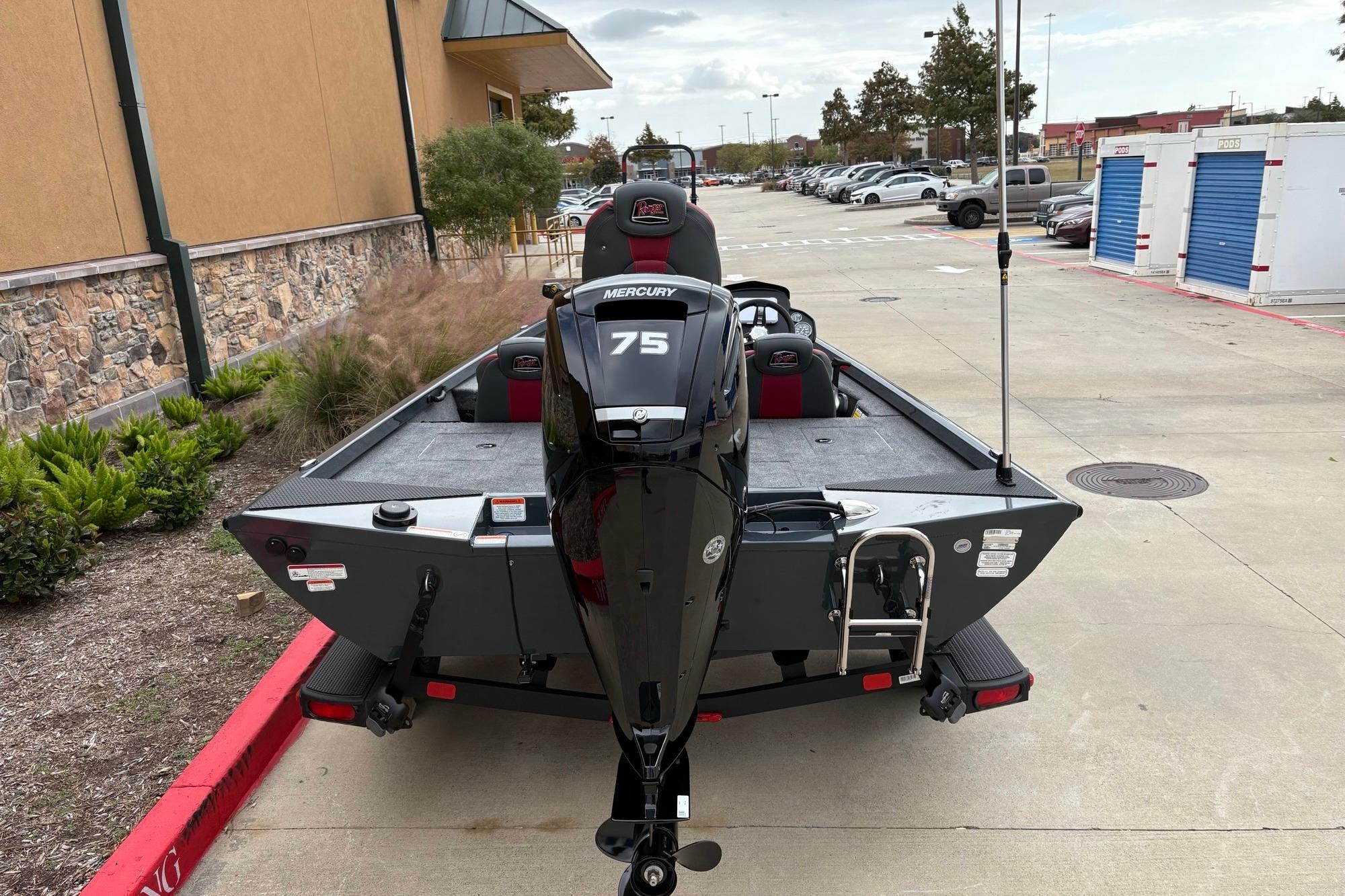 2026 Ranger RT178 boat with Mercury 75 engine parked outdoors.