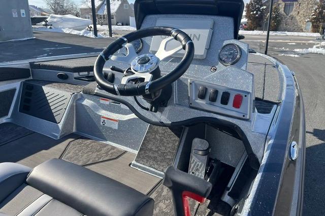 2026 Nitro Z19 XL Pro boat cockpit with steering wheel and control panel.