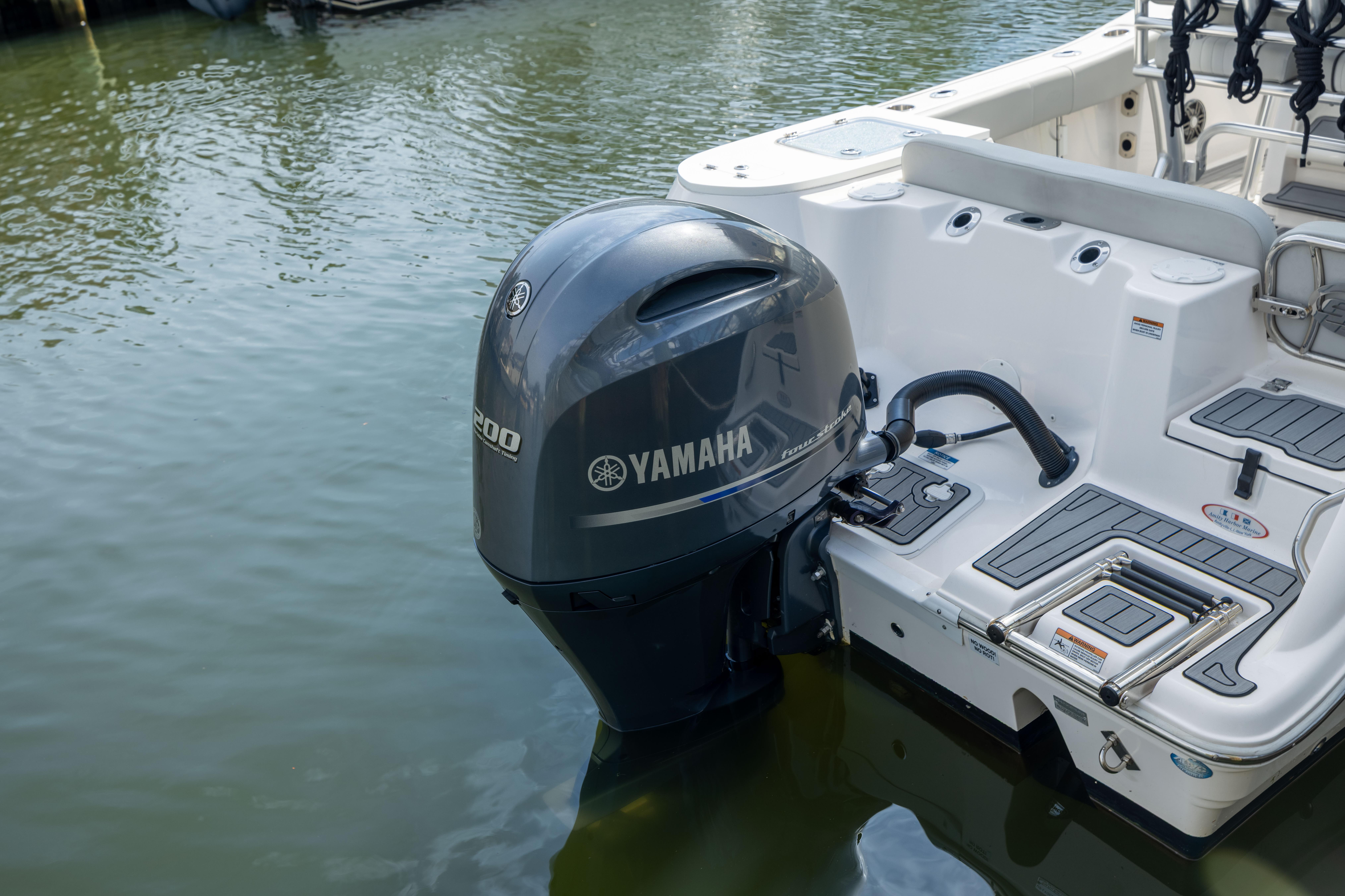 2023 Sea Fox 228 Commander with Yamaha outboard motor on calm water.