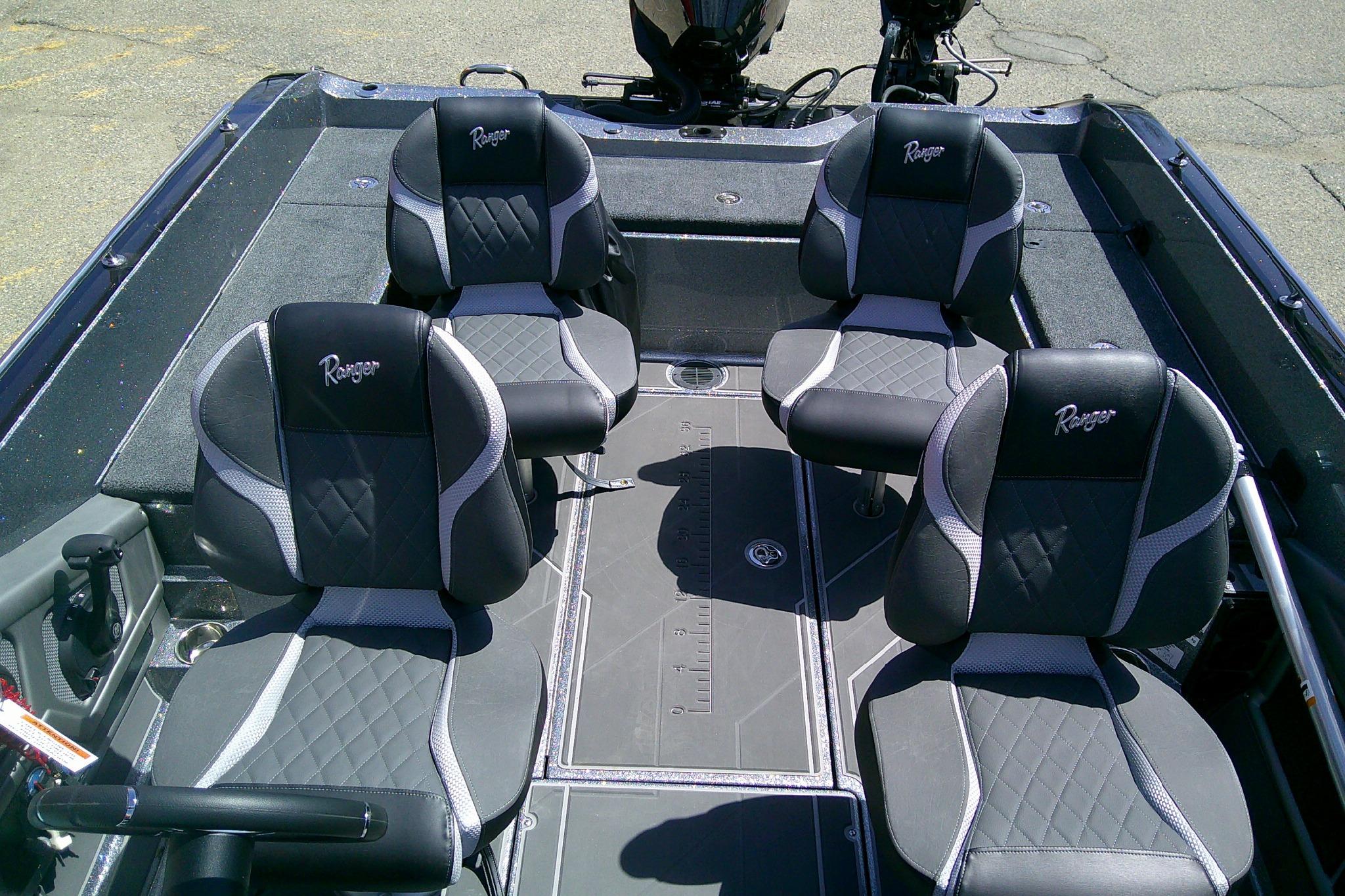 2026 Ranger 620FS Cup-Equipped boat interior with four cushioned seats.