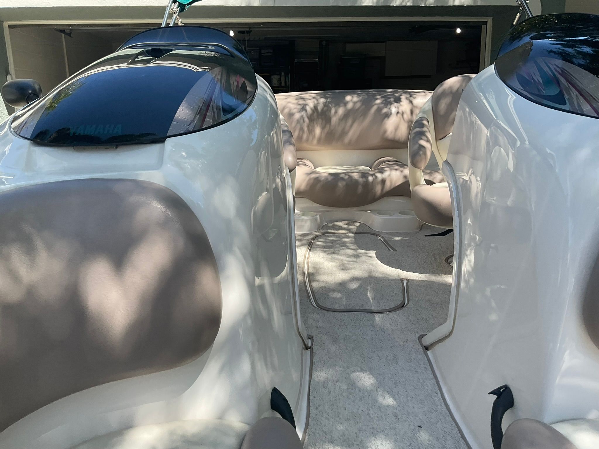 Interior of a 2000 Yamaha LS2000 boat with beige seating.