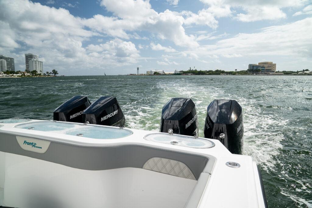 2026 Front Runner 37 Catamaran with four Mercury engines cruising on a sunny day.
