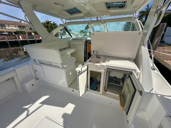 2006 Tiara Yachts 3200 Open interior with seating and open storage compartments.
