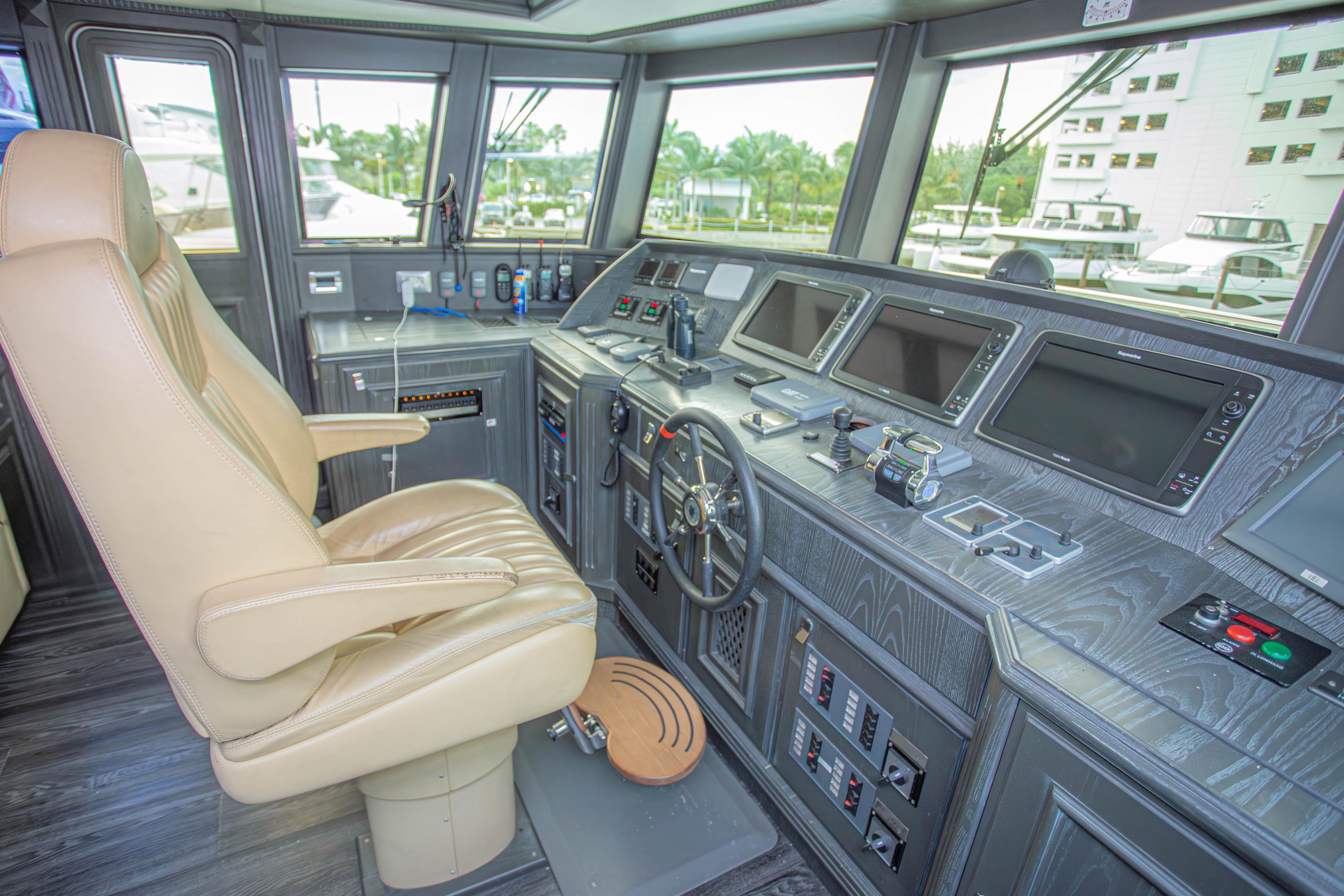 Luxurious 2014 Fifth Ocean Yachts 24m Explorer Yacht helm with advanced navigation systems.