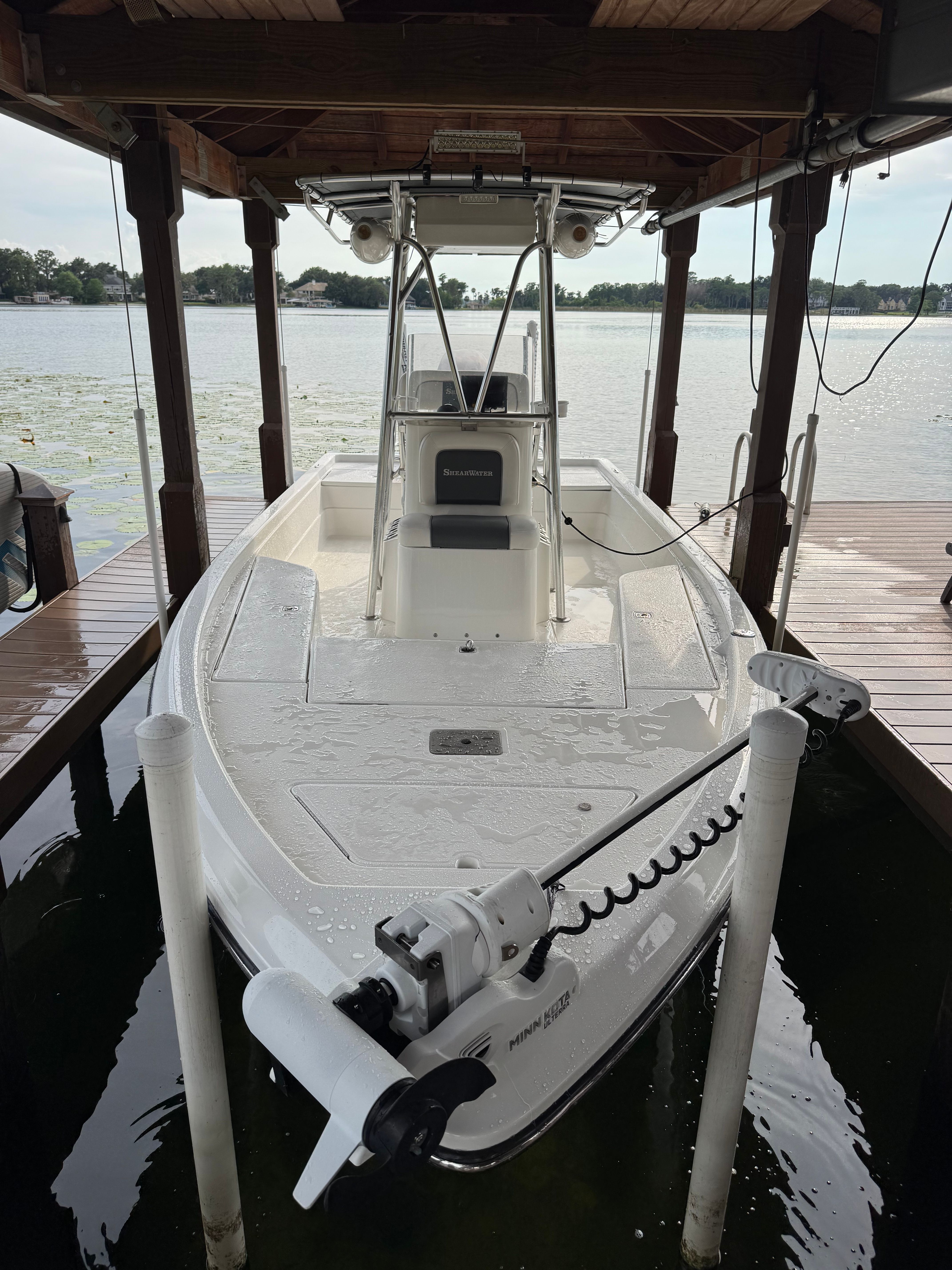 2004 ShearWater LTZ boat in a covered dock.
