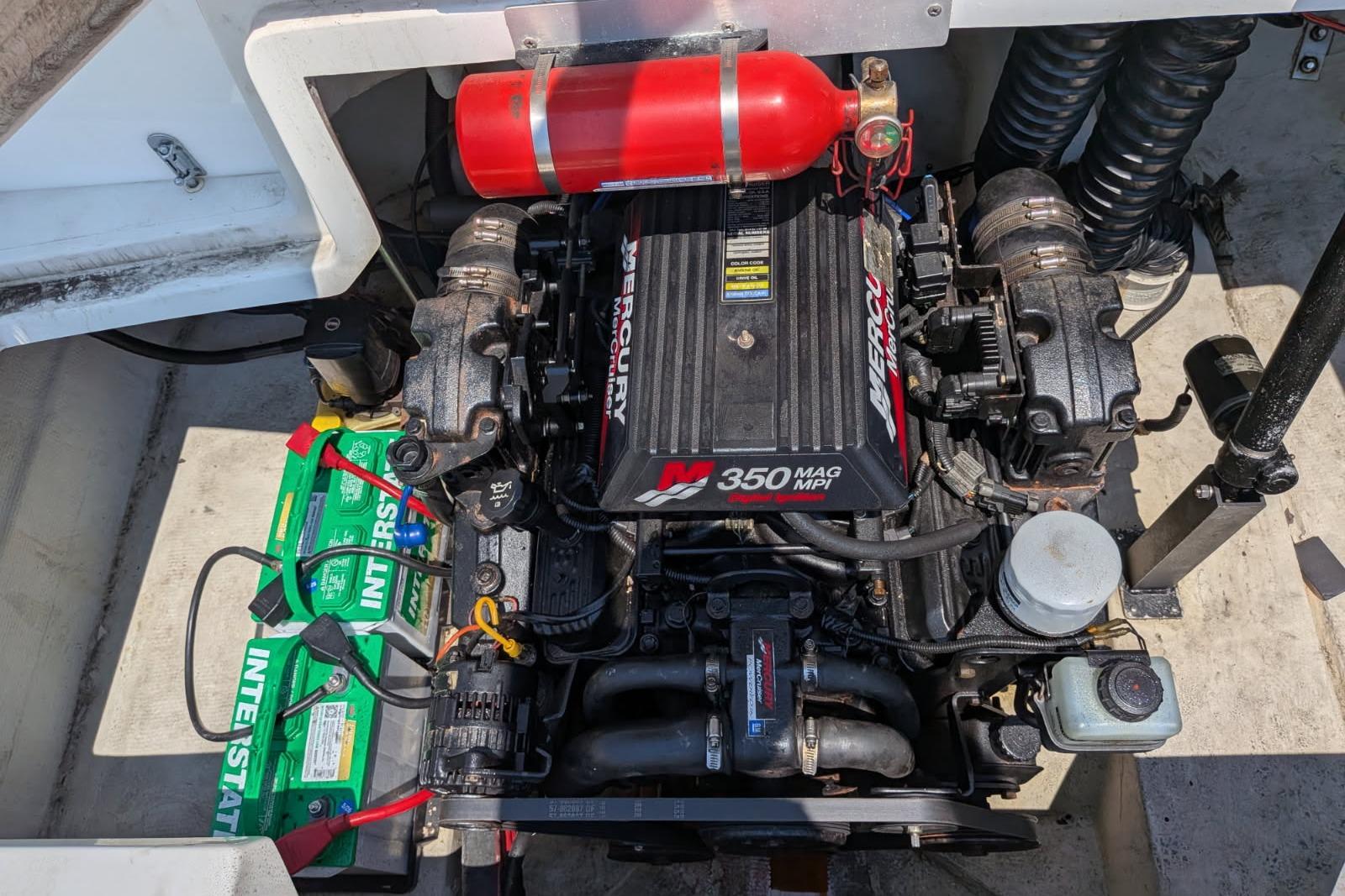 Engine compartment of a 2020 Cobalt 206 with Mercury 350 MAG MPI engine.