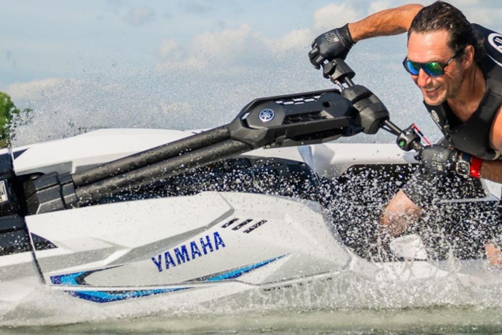 2025 Yamaha WaveRunner SuperJet in action on water, rider enjoying high-speed thrill.