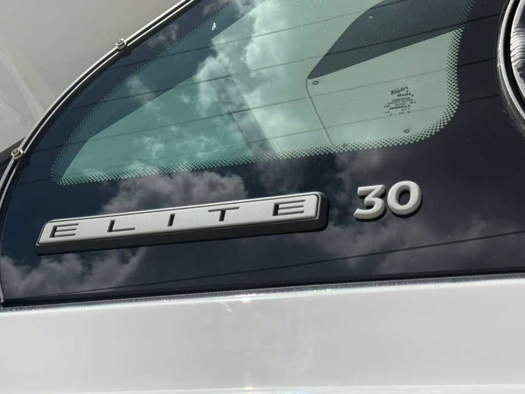 Close-up of the 2026 Monterey Elite 30 OB with a shiny nameplate.