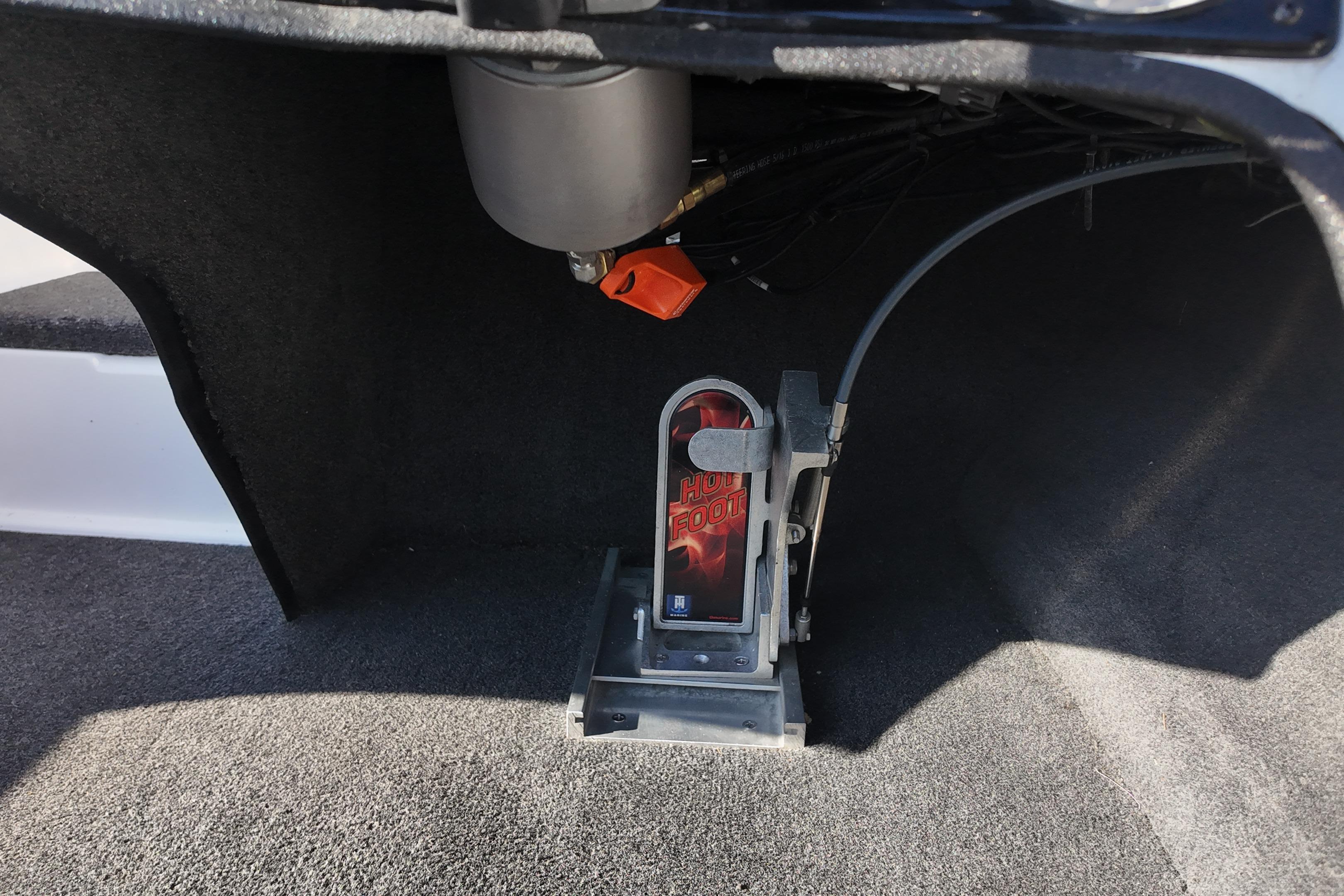 Foot pedal mechanism in a 2022 Bullet 21SDC boat interior.