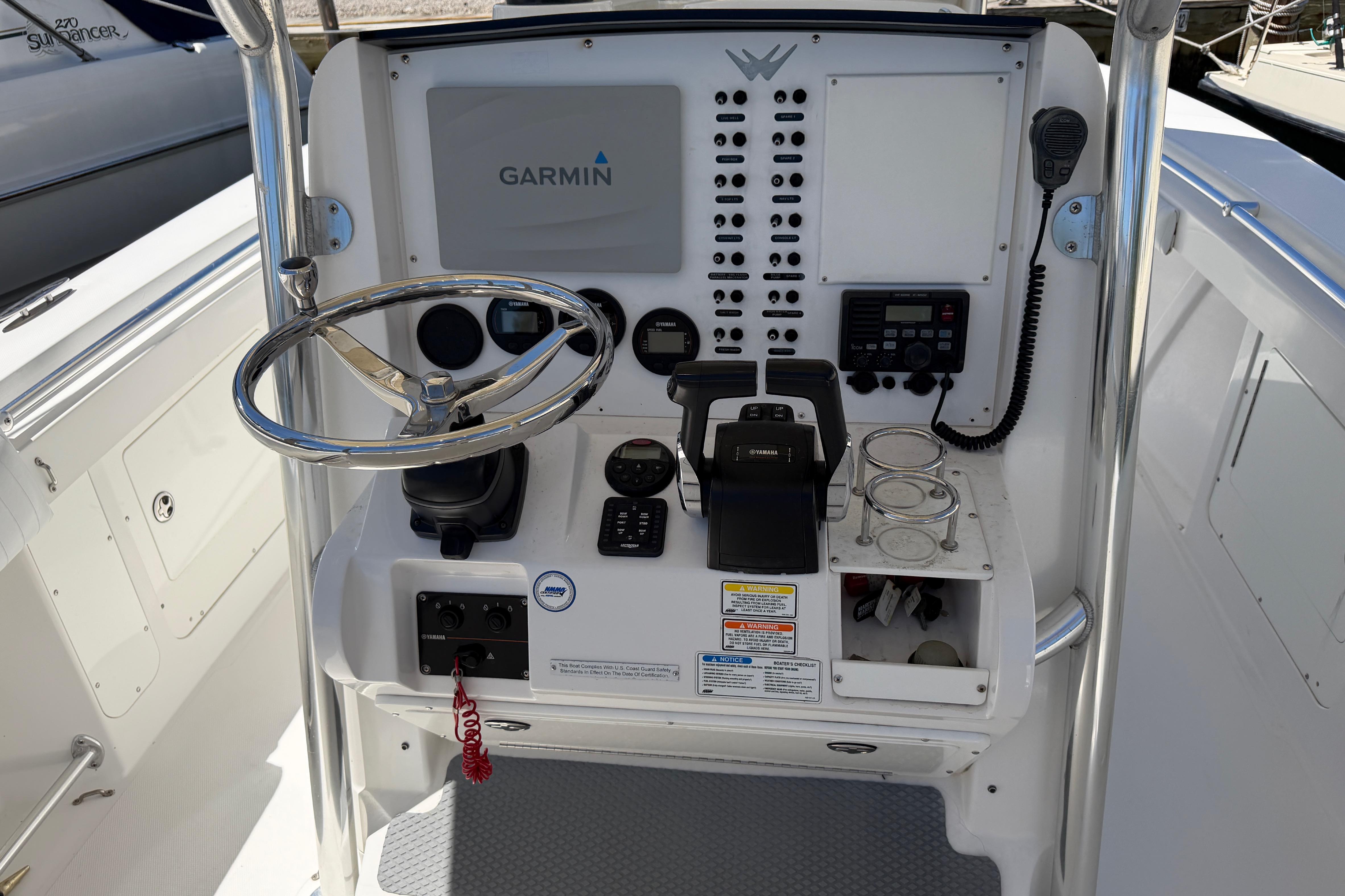 Center console of 2006 Southport 26 boat with Garmin navigation system.