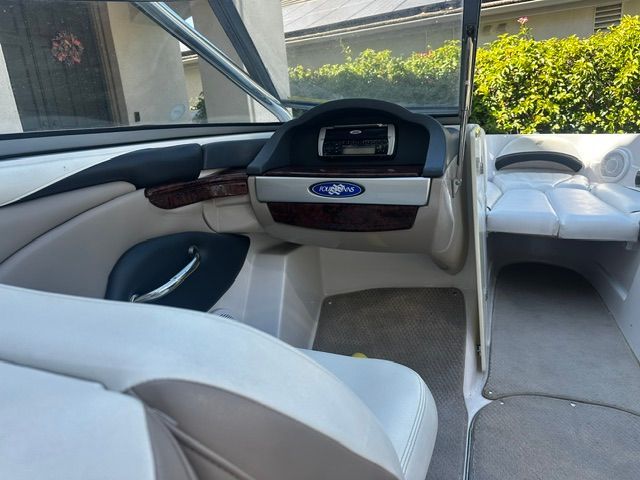 Interior of a 2006 Four Winns 190 Horizon with sleek seating and a modern dashboard.