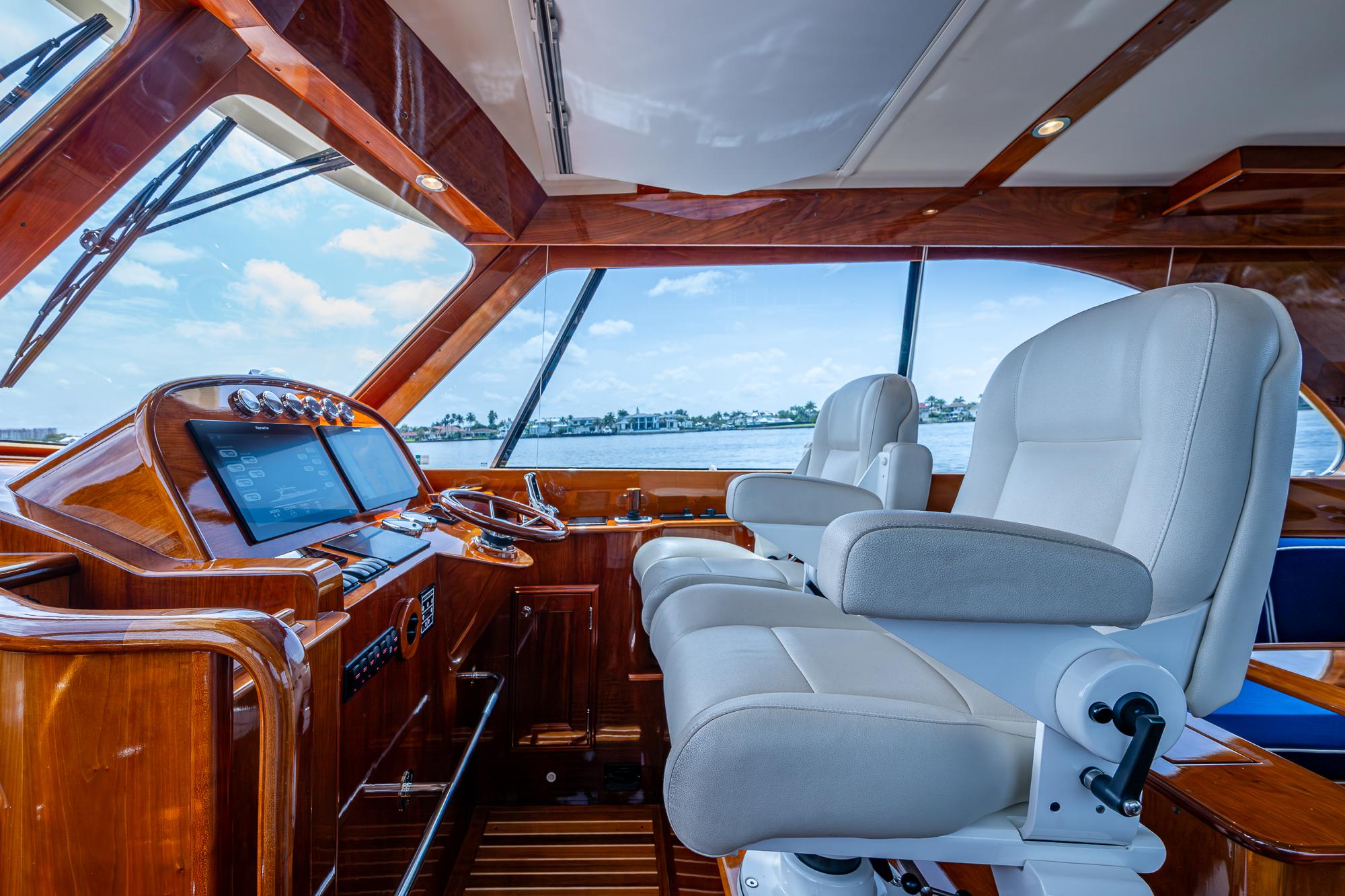 Interior of 2021 Hinckley Talaria 43 Motoryacht with luxurious helm and seating.
