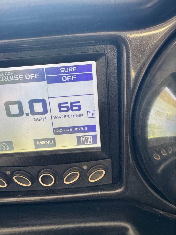 Close-up of a boat display showing speed and water temperature.