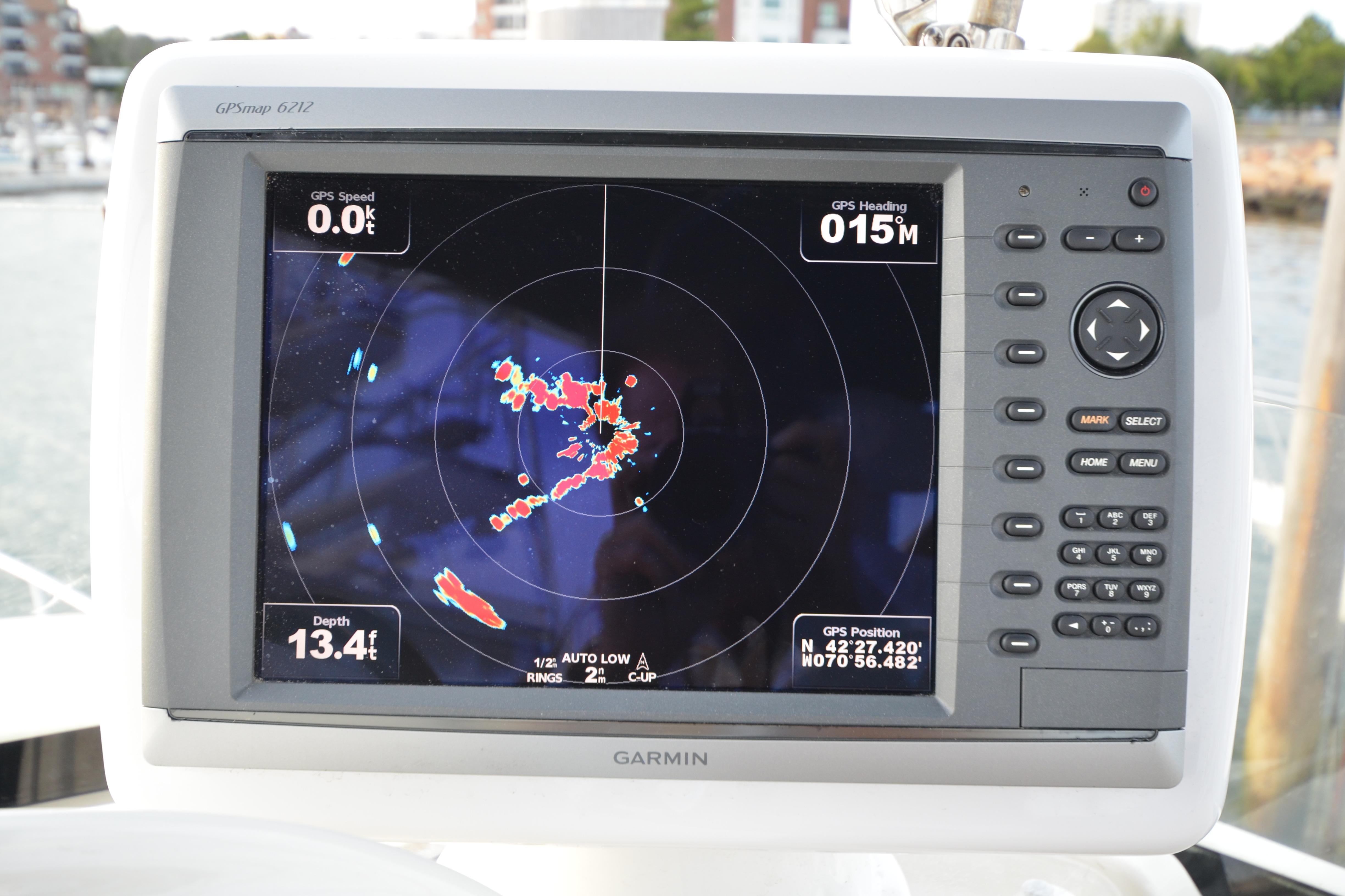 Garmin GPS display on 2007 Jeanneau Prestige 46 yacht, showing navigation data and radar.
