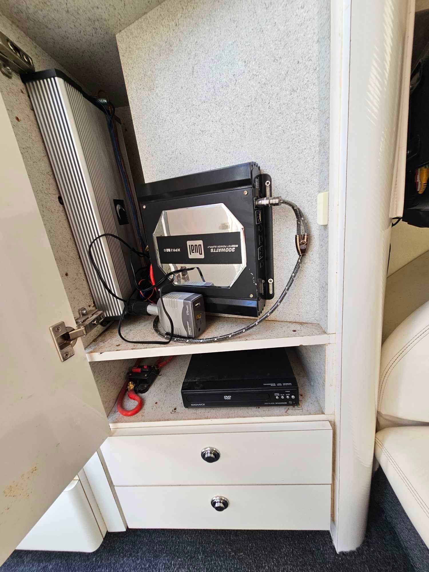 1997 Baja 38 Special Boss boat audio system in cabinet.