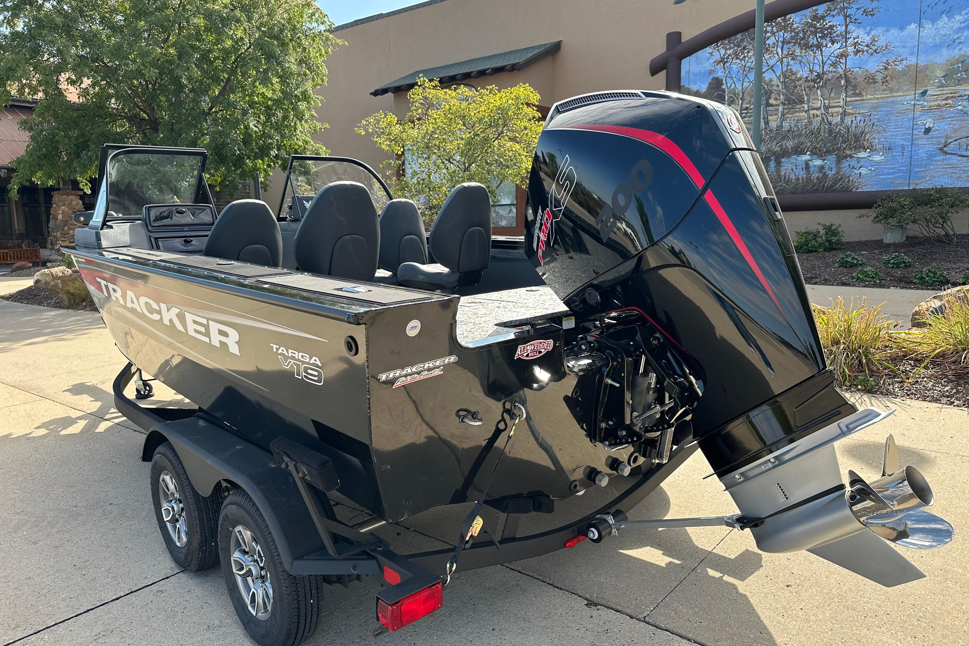 2026 Tracker Targa V-19 WT boat with powerful outboard motor on a trailer.