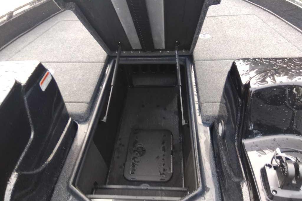 Open storage compartment in 2025 Nitro ZV19 boat interior.