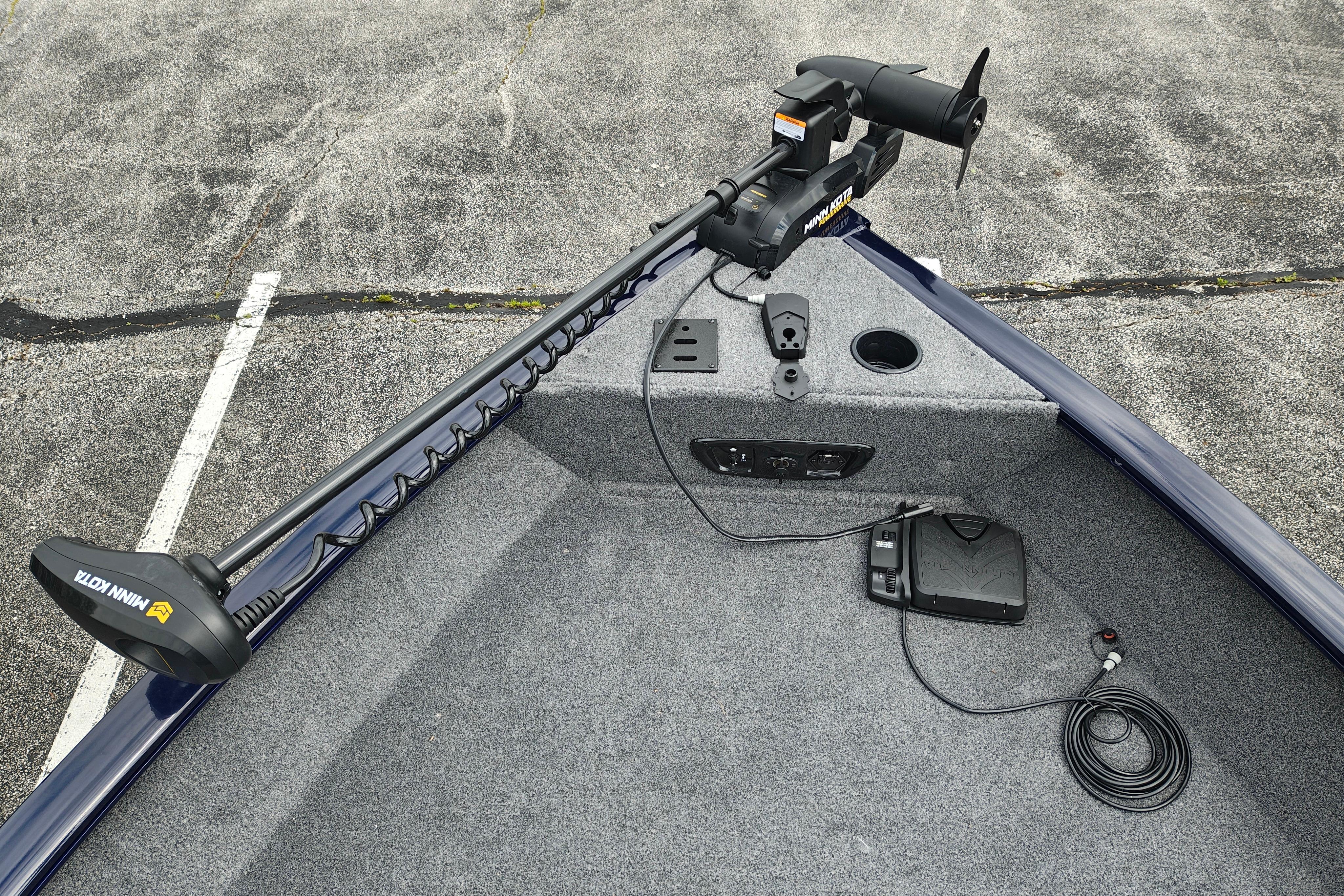 2026 Tracker Pro Guide V-175 WT boat with Minn Kota trolling motor on carpeted deck.